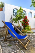 Blue deckchair on a terrace, Capoliveri, Elba, Tuscan Archipelago, Tuscany, Italy, Europe