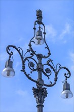 Historic street lamp in Piazza de Ferrari, blue sky, Genoa, Italy, Europe