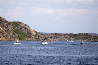 Boats and the archipelago island of Kooen, Marstrand, Vaestra Goetalands laen, Sweden, Europe
