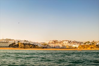 Albufeira with Fishermen Beach seen from the water, Algarve, south of Portugal