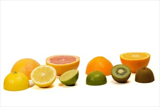 Fresh fruit cut in half. citrus fruits, lime, lemon, orange, grapefruit isolated on white