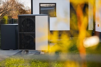 A heat pump in front of an apartment block in Duesseldorf, Germany, Europe