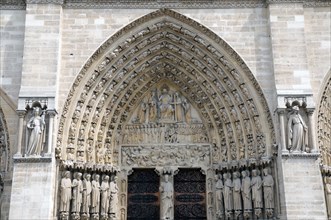Detail of the main portal of Notre Dame Cathedral, Paris, FranceParis, France, Europe