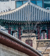 Seoul, South Korea, March 18, 2017:Side gate house at Seoul Palace with tiled roof and traditional