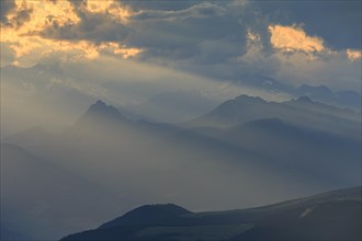 Thunderstorm mood over mountains, haze, grazing light, summer, Sarntal Alps, South Tyrol, Italy,