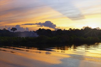 Sunset on the Madeira River, an Amazon tributary, Amazonas state, Brazil, South America