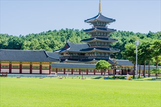 Buyeo, South Korea, July 7, 2018: Main gate of Neungsa Baekje Temple with golden spire on top of