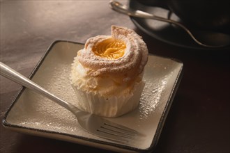 Close up of a brazo de mercedes cupcake, a popular authentic Filipino dessert. Dipolog,