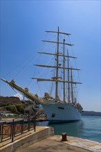Four-masted sailing yacht Star Clipper anchored in the harbour of Portoferraio, Elba, Tuscan