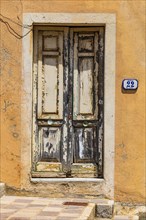 Old weathered front door, Rio Marina, Elba, Tuscan Archipelago, Tuscany, Italy, Europe