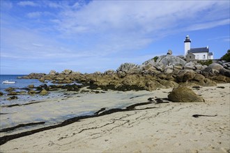 Lighthouse and beach at the Pointe de Pontusval, Plouneour-Brignogan-Plage, department Finistere