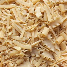 Mixed pasta of various shapes background