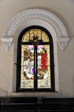 Church window, coloured window in the mausoleum, church on the Cementerio de Cristobal Colon,