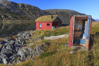 Rorbuer with toilet (outhouse) on the fjord off Bergen, summer, Nordkinn Peninsula, Finnmark,