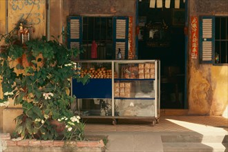Rustic old local bakery stand in the famous colonial town of Kampot, Cambodia, Asia
