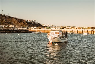 Small boat in marina of Albufeira, Algarve, south of Portugal