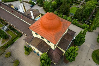 Top view of a striking building with a domed roof surrounded by trees, cemetery, Pforzheim,