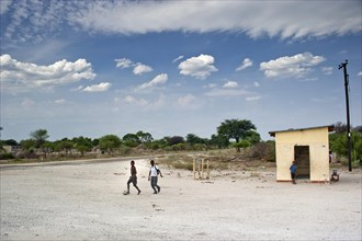 Small village settlement with children playing football, village, children, village, street, street