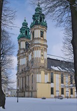 Historic Cistercian Abbey in Krzeszow. Basilica of the Assumption of the Virgin Mary. Winter view.