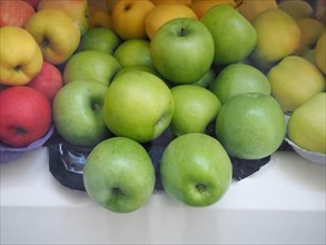 Green red and yellow apples fruits