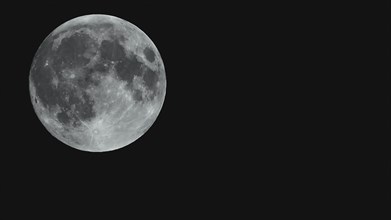 Close-up of a full moon in the dark night sky, Haan, North Rhine-Westphalia, Germany, Europe
