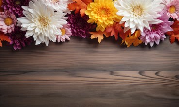 Autumn colored flowers on a dark wooden surface, leaving space in the middle AI generated