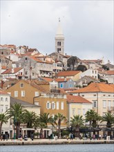 Harbour of Mali Losinj, behind the campanile of the Church of the Nativity of the Virgin Mary,