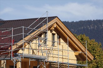 Scaffolded wooden house, renovation, construction site, Garmisch-Partenkirchen, Upper Bavaria,