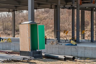 Chungju, South Korea, March 22, 2020: For editorial use only. Port-a-potty with open door at
