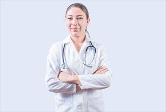 Successful female doctor with arms crossed isolated. Portrait of smiling female doctor with crossed