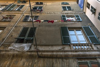 Laundry on the houses in the alleys of the historic centre, Genoa, Italy, Europe