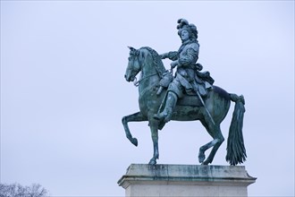 Equestrian statue of Louis XIV in front of the Chateau de Versailles, Yvelines department,
