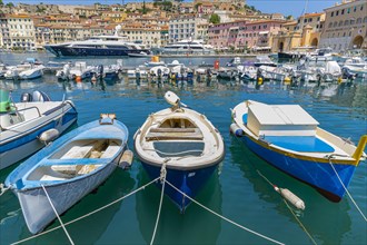 Fishing boats and luxury yachts in the harbour of Portoferraio, Elba, Tuscan Archipelago, Tuscany,