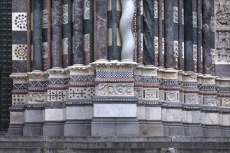 Decorative bases of the columns on the entrance facade of San Lorenzo Cathedral, opened in 1098,