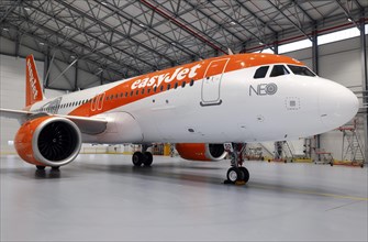 An easyJet Airbus A320 neo stands in the newly opened easyJet maintenance hangar. The entire