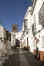 Narrow historic village street of Arcos de la Frontera, Cadiz province, Spain, Europe