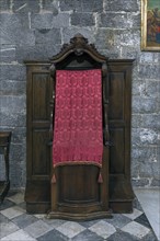 Historic confessional in the church of San Donato, Via S. Donato, 10, in the centre of Genoa,