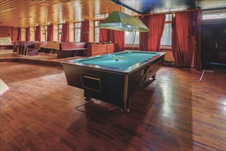 Cosy billiard room with a large table and red curtains, Bad am Park, Lost Place, Essen, North