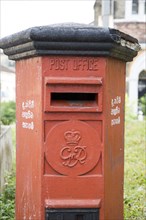 Old red British Post Office pillar box in the historic town of Galle, Sri Lanka, Asia