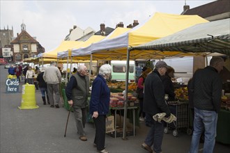 Market stalls in the High Street, Marlborough, Wiltshire, England, UK