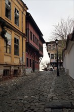 Historic buildings with overhanging upper storeys in historic old town area of Plovdiv, Bulgaria,