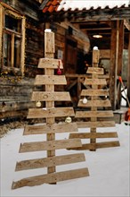 Christmas tree made of wooden boards. Outdoor Christmas decoration, podlaskie, Poland, Europe