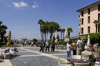 Piazza Giosue Carducci near the harbour, Sirmione, Lake Garda, Brescia, Lombardy, Italy, Europe