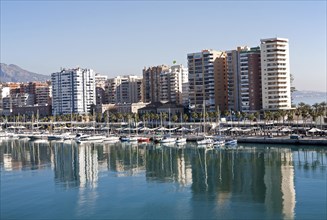 Apartment blocks and yachts in marina of Muelle Uno port development, city of Malaga, Spain, Europe