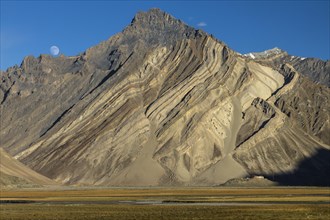 Impressive cliff in the Zanskar Mountains of the Himalayas, with clearly visible folded strata, the