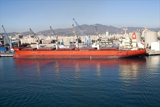 Cargo ship bulk carrier in the port of Malaga, Spain, Europe