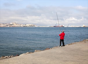 Man sea fishing Melilla autonomous city state Spanish territory in north Africa, Spain, Europe