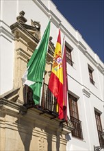 Flags outside the Ayuntiamiento, Plaza del Cabildo, village of Arcos de la Frontera, Cadiz