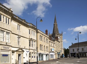 Market place buildings and St Andrew's church spire, Chippenham, Wiltshire, England, UK