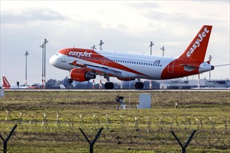 An Airbus A-320 of the airline easyJet takes off at BER Berlin Brandenburg Airport Willy Brandt,